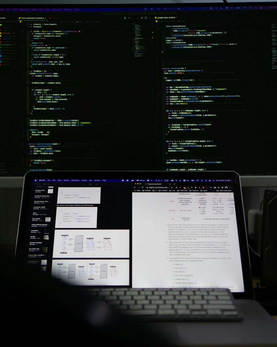 a-laptop-computer-sitting-on-top-of-a-desk-d2ubzwicijo